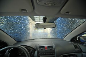 Best Car Wash in Aurora - Car Dashboard running through Car Wash